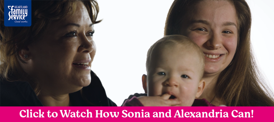 Watch how Sonia and Alexandria Can. Close shot of faces of two women, one holding a baby.